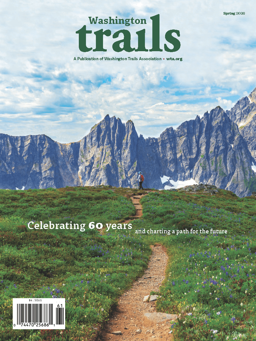 Washington Trails magazine, winter 2024 edition, featuring a photo of Mount Rainier under the milky way. Theme: Embracing joy 